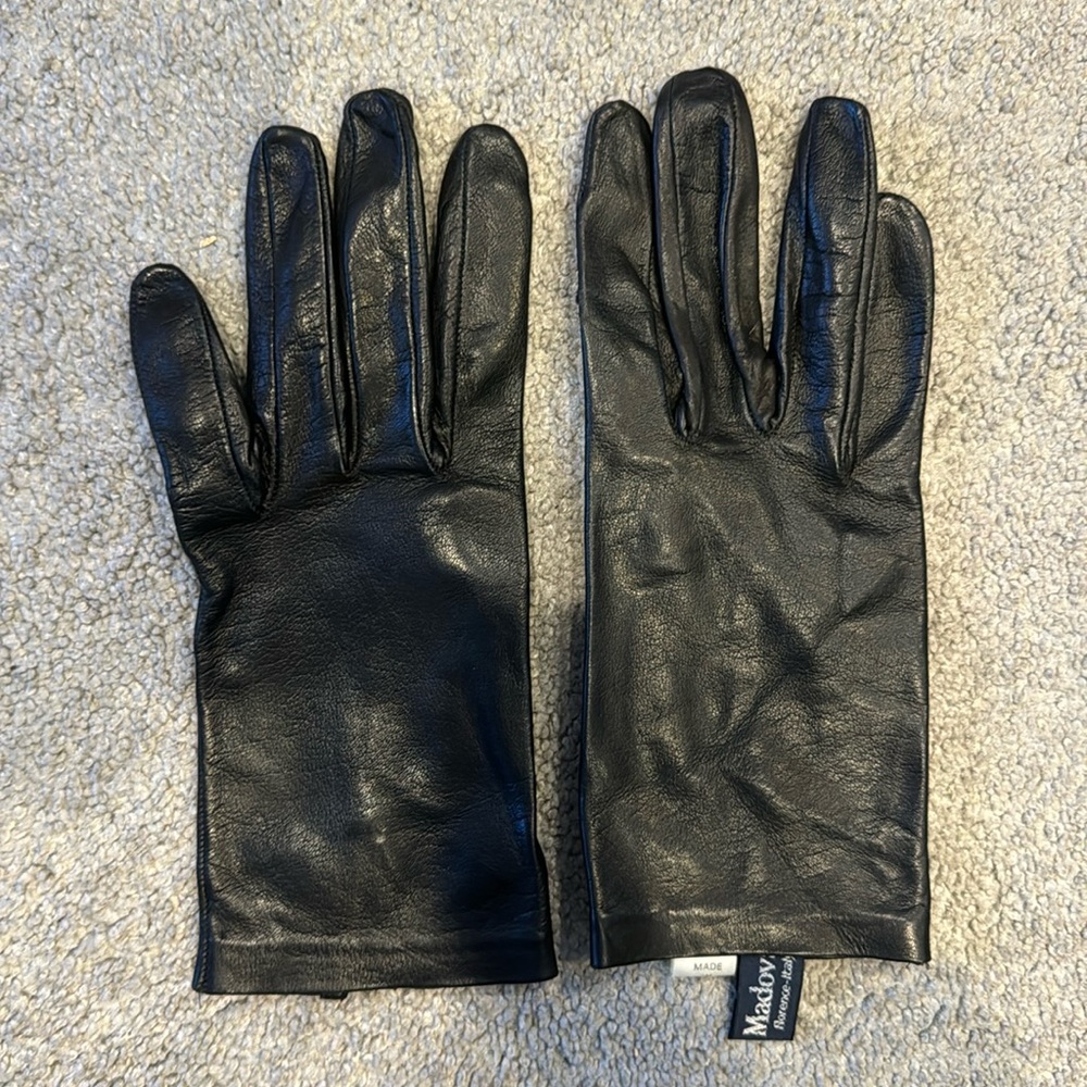 Black leather wrist length unlined very soft leather gloves